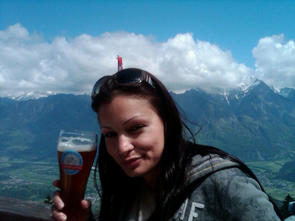 On top of mount Gonzen in Switzerland overlooking Liechtenstein below having Weissbier :)