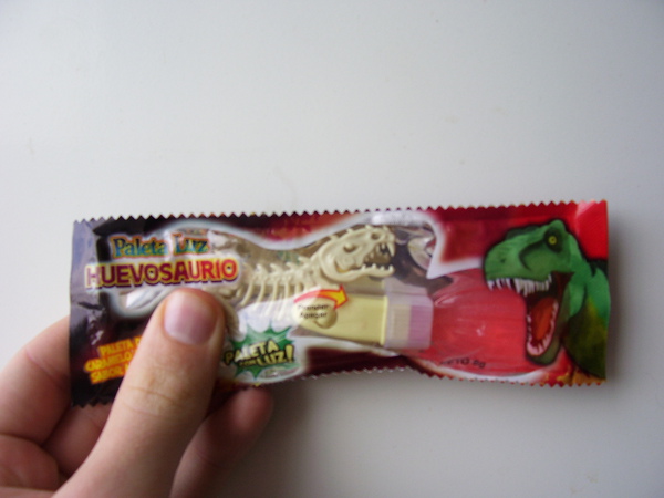 Sir Jesse, Gentleman Adventurer, sent me this.  He's in Bolivia right now, and he found this candy.  

I made T-Rex, Aaron Diaz (http://www.dresdencodak.com) did a guest strip for me (http://www.qwantz.com/index.php?comic=996) with his version of T-Rex and then THE BOLIVIANS stole that that to sell light-up dinosaur candy.

WHAT