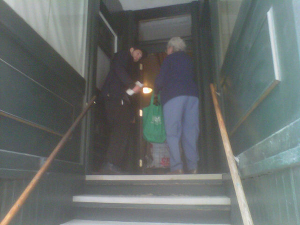 Josh helping a little old lady with her groceries in bostons little italy. Such a sweet boy