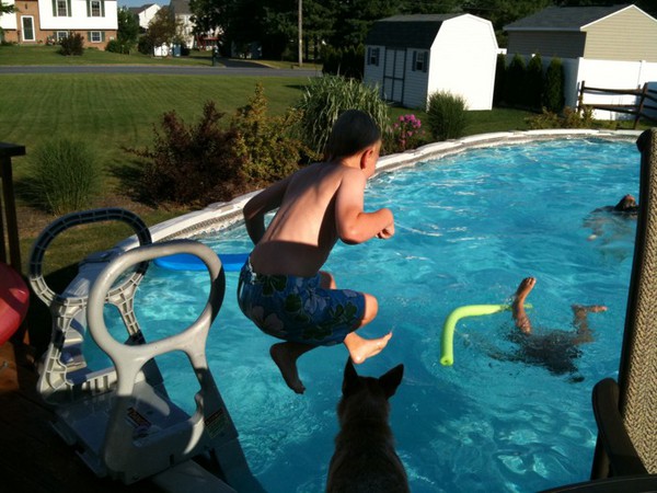 Watching the kids swim.