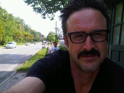 My nephew Evan and I riding our bikes through town