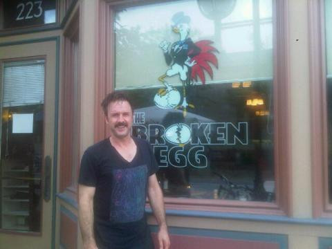 Sweaty from the bike ride- now eating at the broken egg. Best breakfast in town