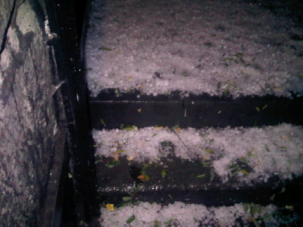 Hail covering prospect heights.  Ish is crazy. About to get drenched