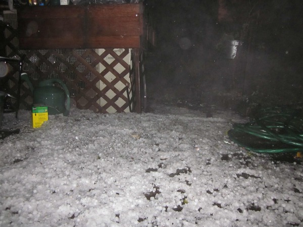 Brooklyn's insane 2010 weather story continues. My deck after hail storm: 
