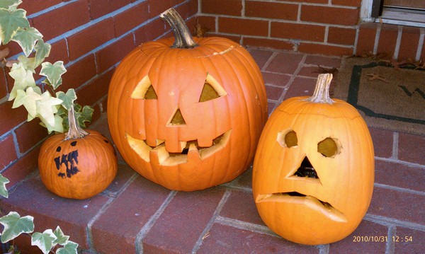 Halloween. Son painted left, I carved middle, Freehusband carved right.