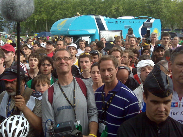 A small fraction of the crowd at the bus