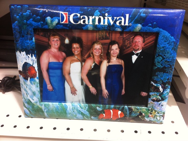 Seen at Savers today. Why would someone thrift off their Carnival cruise photo? Also: nice sunburn, Mom. 