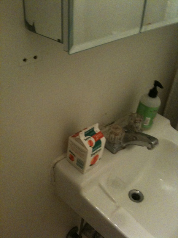 Who would leave orange juice in my bathroom? 