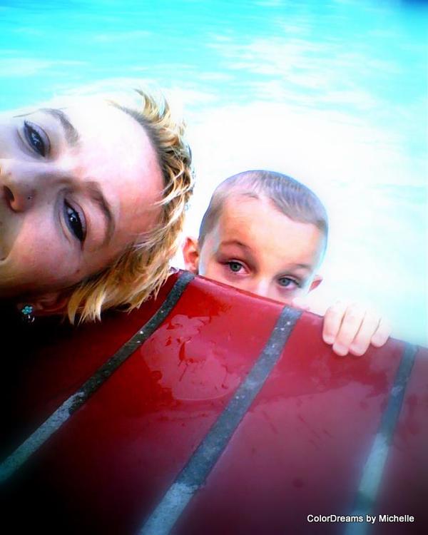 Here we are again, Caden is in the pool, I am actually laying on the ground holding my little laptop above our heads!! LOL  (tad bit concerned about dropping it IN during this shot, btw!) :D