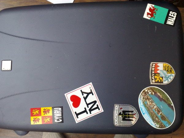 My suitcase is starting to collect stickers from places I've not been to, thanks to @helenduffett
