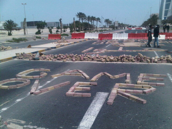 King faisal highway blocked by protesters. "Game Over" is written with stones. #bahrain #feb14 #lulu