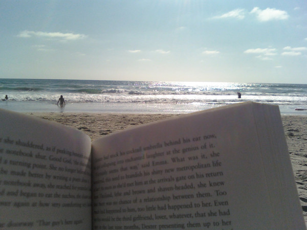 reading at the beach :) I love being home!