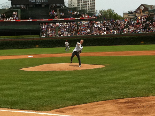 Actor @TomFelton (Draco from Harry Potter) throws a first pitch at Wrigley Field.