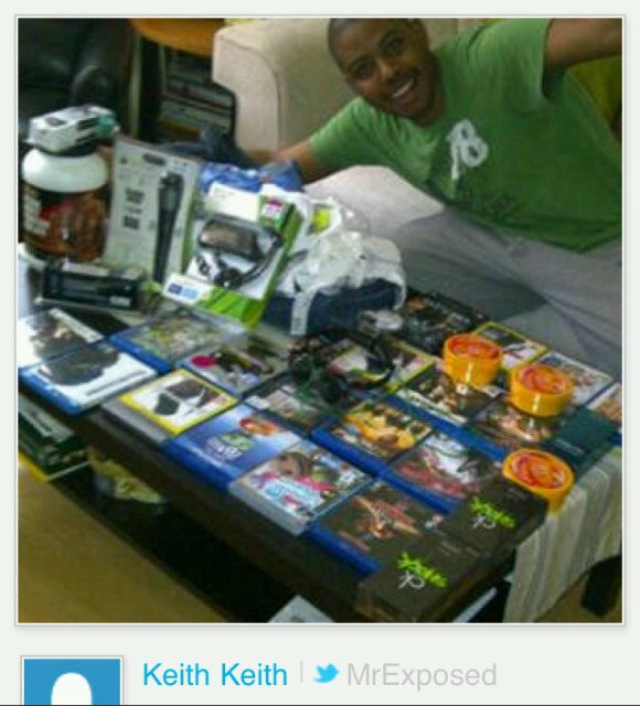 Tottenham looter posing with his loot. Dumbass.