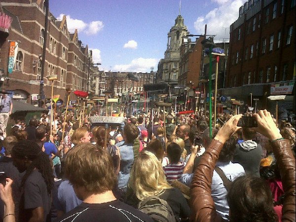 Brooms aloft.