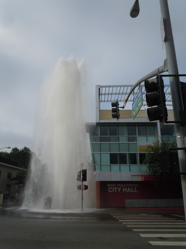We Ho City Hall got a much needed cleansing this a.m. when a car took out a fire hydrant on the corner