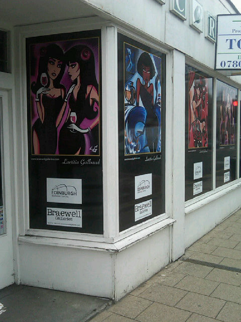 Windows of vacant shop on porty high street have had a makeover.