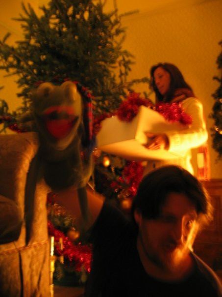 Bill Barretta puppeteers Robin the Frog in preparation for a scene in "A Muppets Christmas: Letters to Santa"