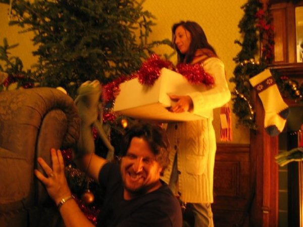 Bill Barretta puppeteers Robin the Frog in preparation for a scene in "A Muppets Christmas: Letters to Santa"