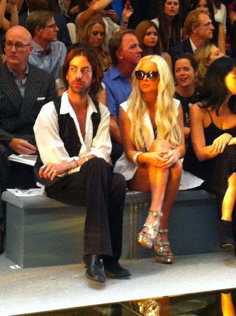 #NYFW Front Row Chronicles: Lindsey Lohan siting across from me in a  sleeveless white Tux jkt and vegas shoes           