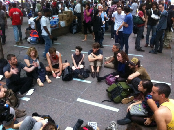 Circling up with protesters at #occupywallstreet, forming plans for ways the arts community can organize #livingasform