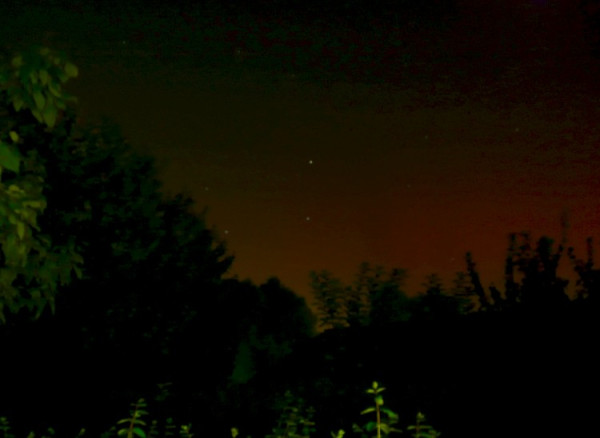 Is this a hint of auroral glow in the North - or just light pollution from Bonn? Inconclusive picture taken from Königswinter-Heisterbacherrott, NRW, Germany, around 21:20 UTC today; unfortunately there is no 'control' from a definitely aurora-free evening under similar sky transparency.