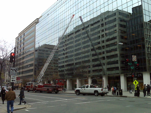 Fire trucks and building evacuated @ 17th & L.