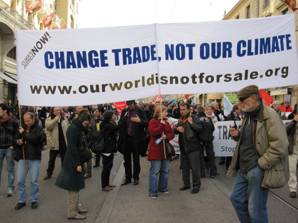Our World Is Not For Sale marching through Geneva yesterday - "Change Trade, Not Climate"