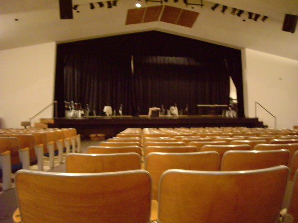 Who is that sitting on the edge of the old HTC stage, transparent legs dangling over?