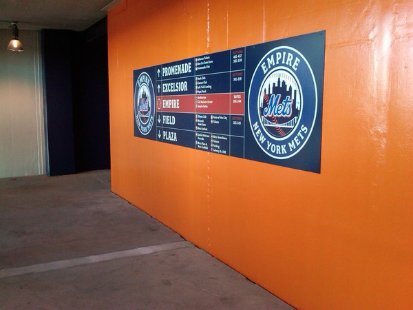 Citi field stairwell walls painted orange and blue
