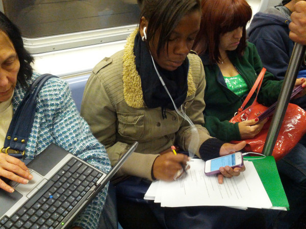 Caught a real life slice of mobile mania on the NYC subway. True multi-device usage on the go!