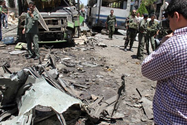 http://www.presstv.ir/

#Syrian security forces inspect the scene of an explosion that targeted a military bus near the Syrian capital, on June 8, 2012. At least seven people were killed in blasts near #Damascus.