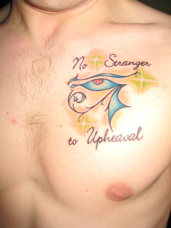 My first tattoo on my 18th birthday. "No Stranger To Upheavel" is from Adam Lambert's Music Again.