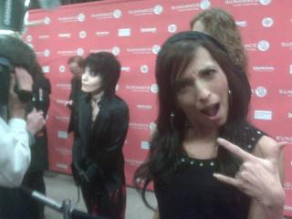 On insane carpet with Joan Jett - says she waited this long for a bio pic cuz she didn't know anyone cared -Natasha
