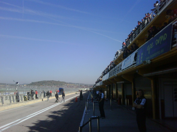 View from the pit-lane. Loads of spectators in the stand above