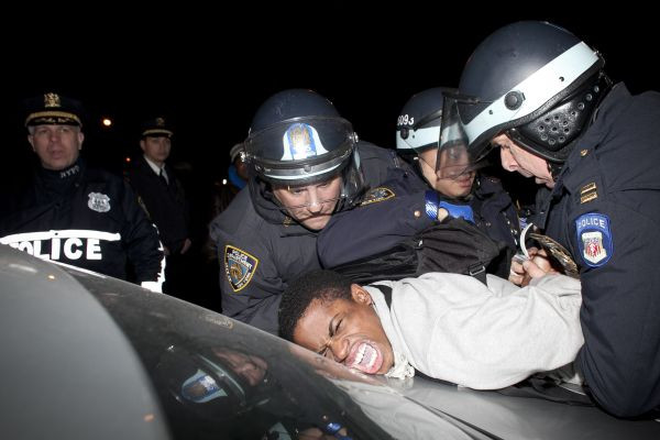 A man is arrested at a protest against the #shooting of #Kimani #Gray, March 13, 2013 in the East Flatbush neighborhood of the #Brooklyn borough of New York City. 