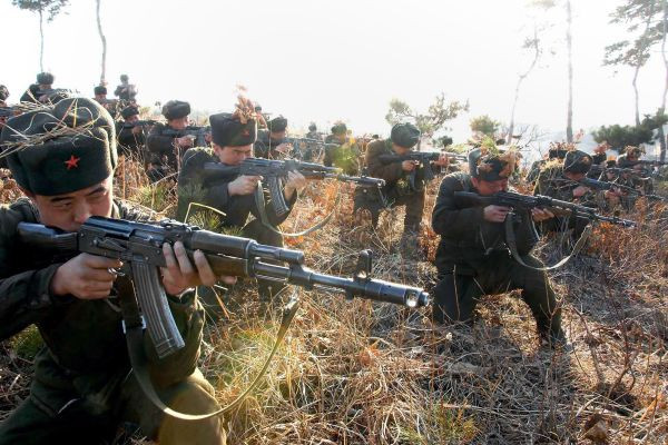 Members of North Korea's Worker-Peasant Red Guards, attending a military drill at an undisclosed location on March 14, 2013.