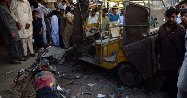 Local Pakistani residents gather at the site of an overnight #bomb blast in #Karachi on March 15, 2013. 