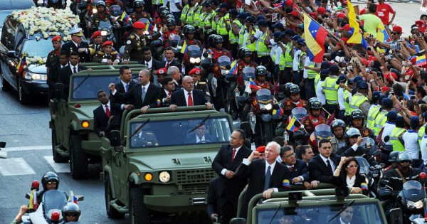 The coffin with the body of late Venezuelan President Hugo #Chavez is taken to former 4 de Febrero barracks in #Caracas, on March 15, 2013. 