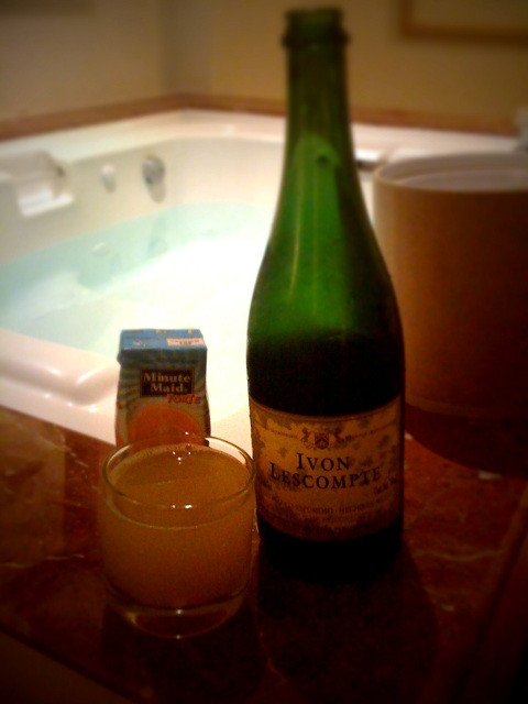 Enjoying our last evening in Playa by soaking in our double jacuzzi and drinking champagne mimosas.  